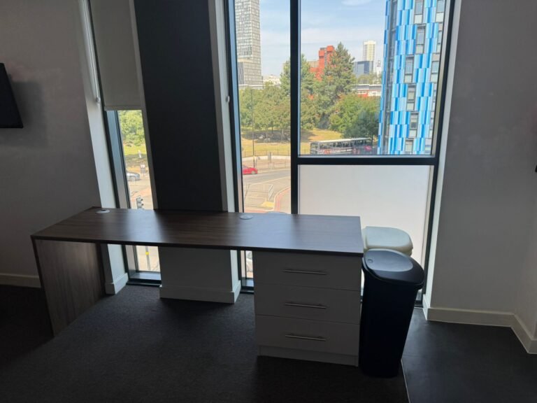 Student room after end-of-tenancy clean — desk wiped, floors vacuumed, windows detailed.