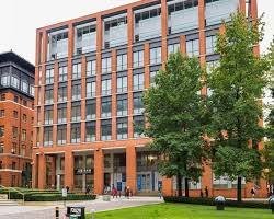 Exterior of a modern multi-tenant office building in Brindleyplace Birmingham, representing sites managed by facilities management companies.
